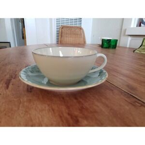 Vintage cottagecore mismatched White Olympia teacup, blue Ainsley sauce